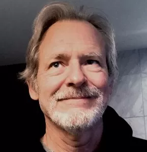 A photo of Flavian Mark Lupinetti, a cardiac surgeon and poet.