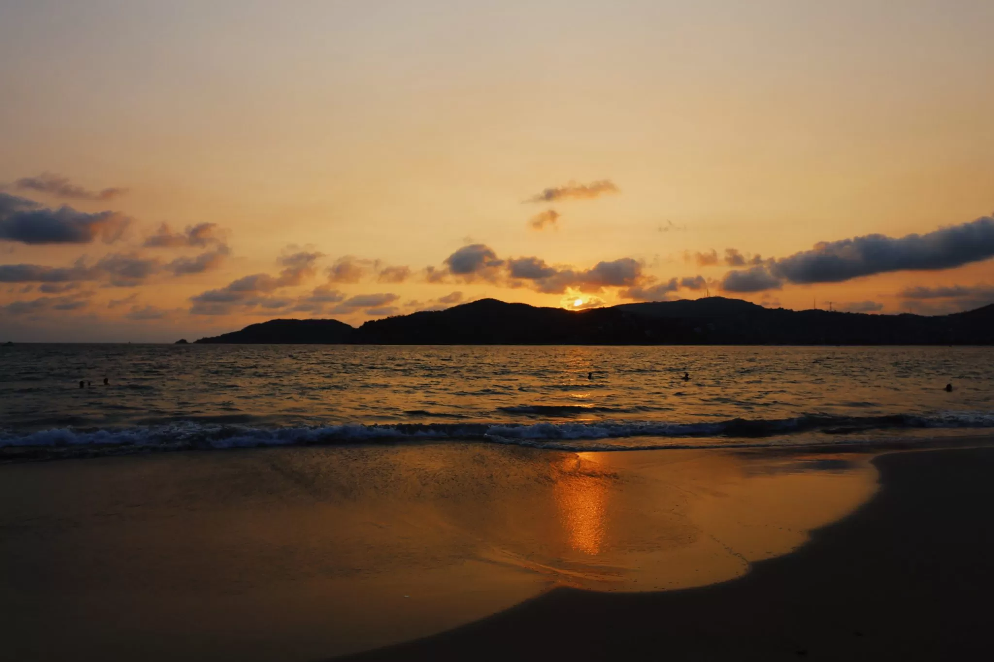 Zihuatanejo beach sunset evoking timeless peace in coastal poetry