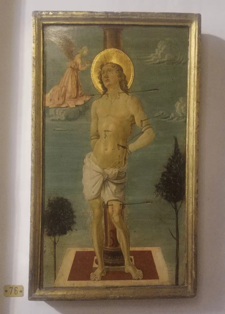Painting of St. Sebastian pierced by arrows, illustrating suffering and faith