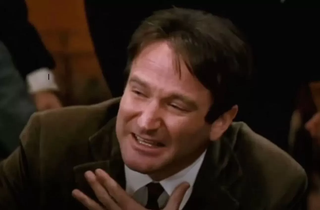 Still from Dead Poets Society featuring students in a classroom setting